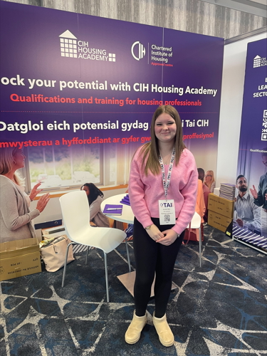 Summer attending the Tai event stood next to the CIH Housing Academy stand