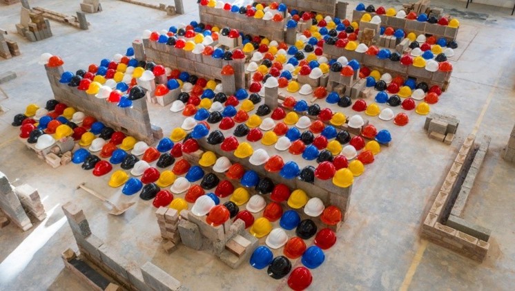 hardhats representing male suicides in construction